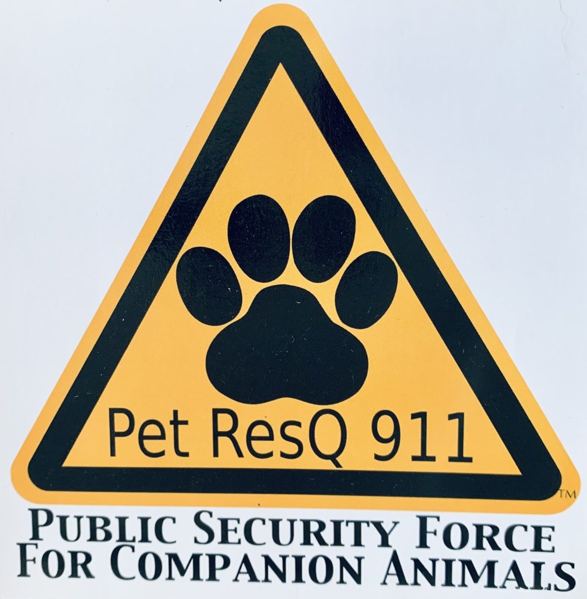 PetResQ911 logo sticker: a black paw print inside a yellow triangle, with the tagline Public Security Force for Companion Animals