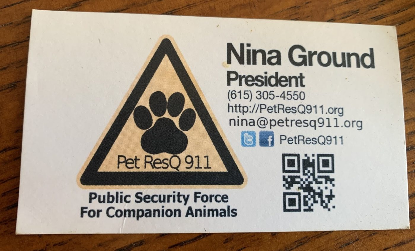 An original PetResQ911 business card for Nina Ground, President, with the yellow triangle paw logo and the tagline Public Security Force for Companion Animals